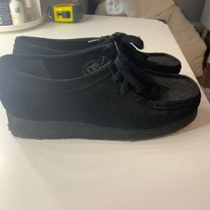 black suede clark’s wallabee